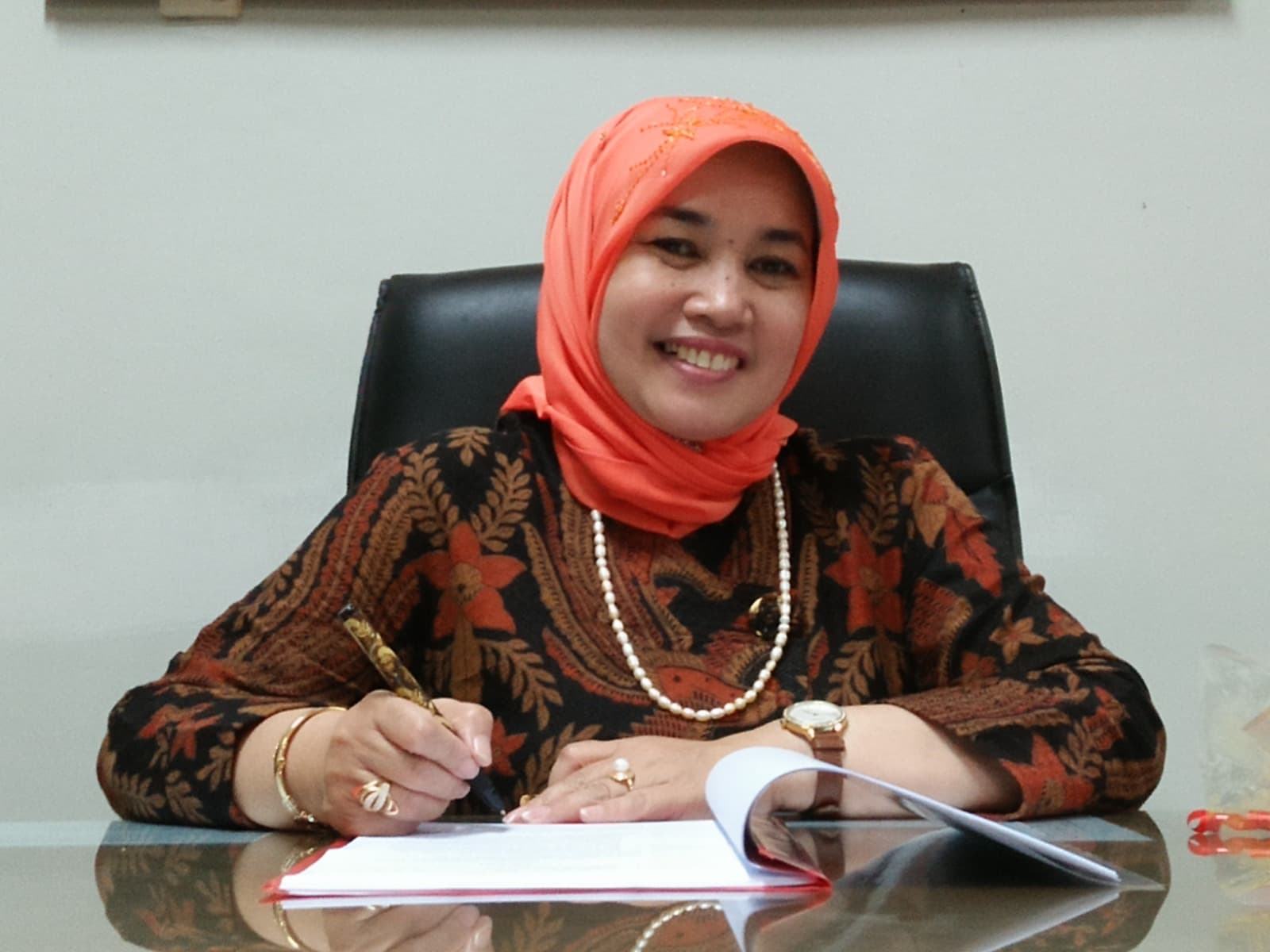 Dra. Hj. Aan Sri Analiah